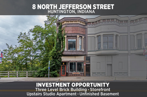 Investment Property: Ornate Brick Commercial Building with Studio Apartment. Unfinished Basement