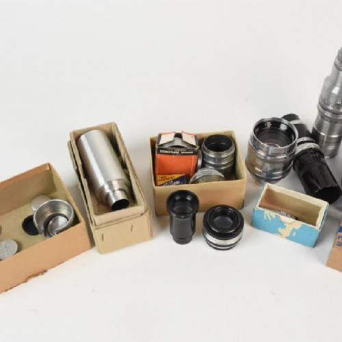 Assorted Camera Lenses And Accessories